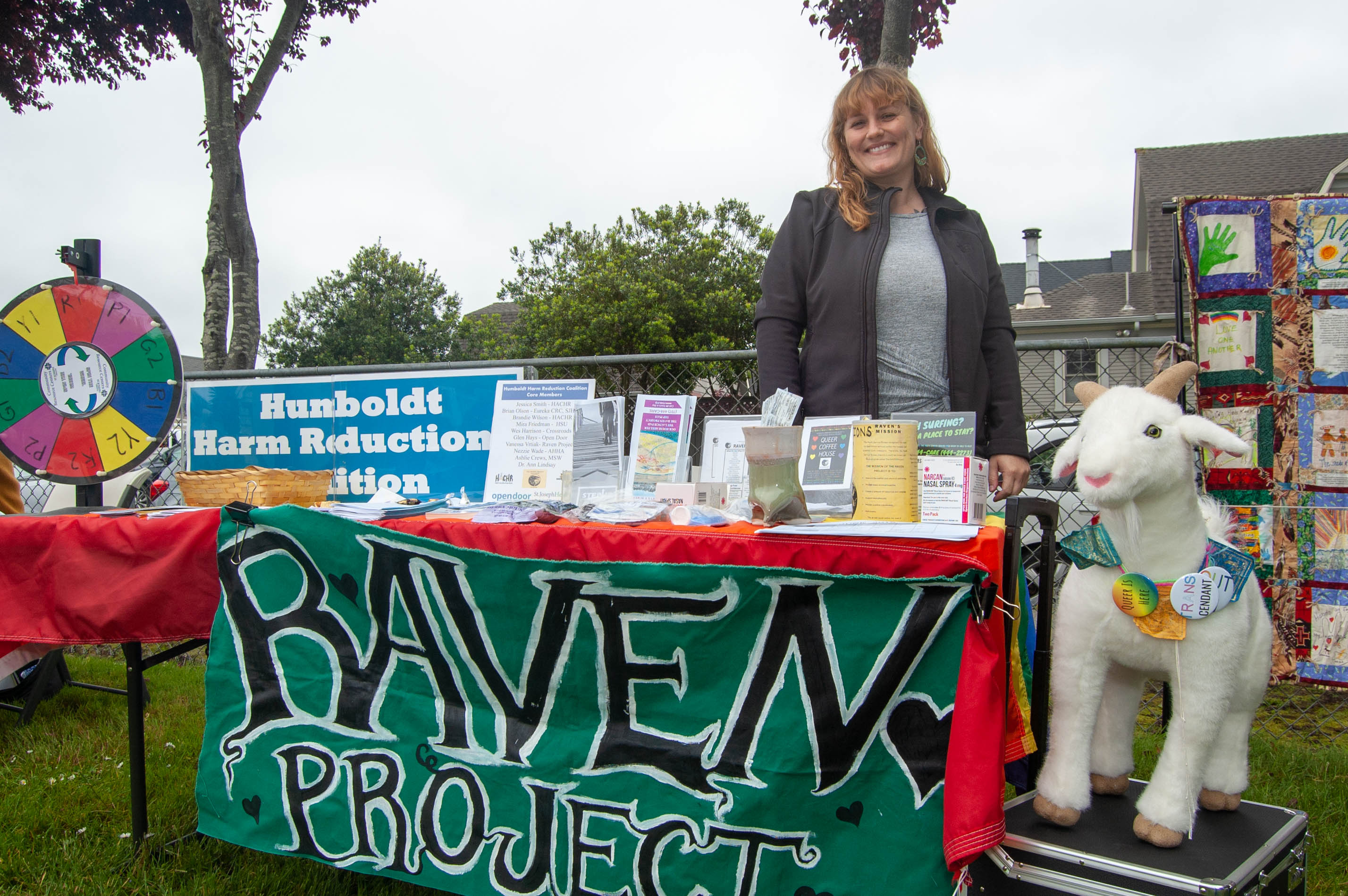 Health Fair booth for Raven Project showing services they offer, including Humboldt Harm Reduction Coalition